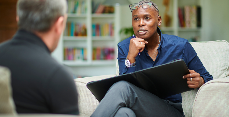 A male patient talking to a therapist