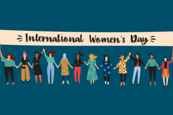 Cartoon-style graphic of 12 women standing in a line, holding a banner which reads: International Women's Day