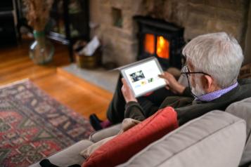 Older man using a tablet/iPad