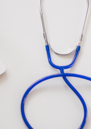 Image of a stethoscope and a laptop